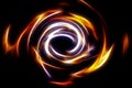 Beautiful abstract fire circle on a black background. Royalty Free Stock Photo