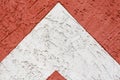 Beautiful abstract grunge decorative dark red and white stucco wall background. The shape of an arrow, a triangle. Art Rough Royalty Free Stock Photo