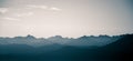 A beautiful, abstract monochrome mountain landscape in blue tonality. Royalty Free Stock Photo