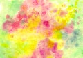 Beautiful abstract smudges of yellow, pink, green and white colors watercolor background