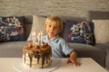 Beautiful adorable five year old boy in blue shirt Royalty Free Stock Photo