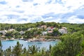 Beautiful Adriatic sea in Croatia  Hvar  small village blue lagoon  coast  green pines  trees Royalty Free Stock Photo