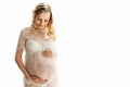 Beautiful adult pregnant woman. Waiting for the baby. Pregnancy. Care, tenderness, motherhood, childbirth. White Royalty Free Stock Photo