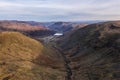 Beautiful aerial drone landscape image of sunrise Winter view from Red Screes in Lake District looking towards Brothers Water and Royalty Free Stock Photo