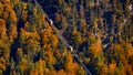 Beautiful aerial fall view of cable car ropeway funicular in austrian alps. Red cable railway car in the mountains Royalty Free Stock Photo