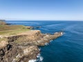 Beautiful aerial high angle drone view of Slope Point, the southernmost point on the South Island of New Zealand. Royalty Free Stock Photo