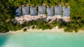 Beautiful aerial landscape view of the tropical island beach with palm trees near ocean Royalty Free Stock Photo