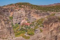 Beautiful aerial panoramic photo of the monasteries and rock formations of Meteora above Kalambaka city at sunset. Thessaly, Royalty Free Stock Photo