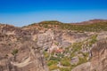 Beautiful aerial panoramic photo of the monasteries and rock formations of Meteora above Kalambaka city at sunset. Thessaly, Royalty Free Stock Photo