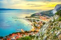 Beautiful aerial panoramic view of Cetina river, mountains and Old town Omis at sunset Royalty Free Stock Photo