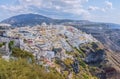 Beautiful aerial panoramic view from the height on the touristic center of Fira town .Fira is the capital of the island Santorini