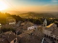 Sunset aerial view of San Marino microstate and Emilia-Romagna region of Italy from the rooftops of the city of San Marino Royalty Free Stock Photo