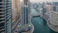 Beautiful aerial top view day to night transition timelapse of Dubai Marina canal Royalty Free Stock Photo