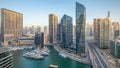 Beautiful aerial top view day to night transition timelapse of Dubai Marina canal Royalty Free Stock Photo