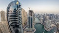 Beautiful aerial top view day to night transition timelapse of Dubai Marina canal Royalty Free Stock Photo