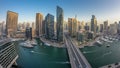 Beautiful aerial top view day to night transition timelapse of Dubai Marina canal Royalty Free Stock Photo