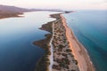 Beautiful aerial vibrant view of Korission Lake Lagoon landscape, Corfu island, Greece with pink flamingos flock, Ionian sea beach