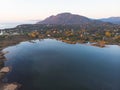 Beautiful aerial vibrant view of Korission Lake Lagoon landscape, Corfu island, Greece with pink flamingos flock, Ionian sea beach