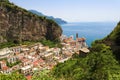 Beautiful aerial view of Atrani village between green branches and cliff rocks, Amalfi Coast, Italy. Royalty Free Stock Photo