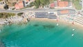 Beautiful aerial view of beach umbrellas in summer season, Cavoli Beach, Elba Island - Italy