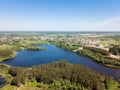 Beautiful aerial view of blue lake and green forest district in Royalty Free Stock Photo