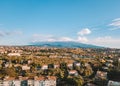 Beautiful aerial view on the Catania city with Etna volcano on the background by the sea.