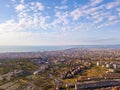 Beautiful aerial view on the Catania city with Etna volcano on the background by the sea.