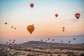 Beautiful aerial view of colorful hot air balloons flying over Cappadocia, Turkey Royalty Free Stock Photo