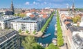 Beautiful aerial view of Copenhagen skyline from above, Nyhavn historical pier port and canal with color buildings and boats Royalty Free Stock Photo