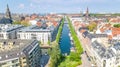 Beautiful aerial view of Copenhagen skyline from above, Nyhavn historical pier port and canal with color buildings and boats Royalty Free Stock Photo