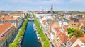Beautiful aerial view of Copenhagen skyline from above, Nyhavn historical pier port and canal with color buildings and boats