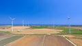 Beautiful aerial view of countryside and industrial windmills