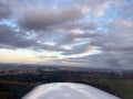 Beautiful aerial view of countryside during sunset from a Plane window Royalty Free Stock Photo