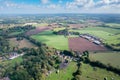 Beautiful aerial view of the Dinton Pastures Country Park, Black and White Swan Lake, and Winnersh Triangle Royalty Free Stock Photo