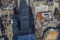 Beautiful aerial view of Empire State Building shadow on skyscraper buildings of Manhattan with  cityscape streets.  New York, Royalty Free Stock Photo