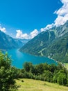 Beautiful aerial view of Kloental lake Kloenthalsee and valley, Swiss Alps, on a sunny summer day with blue sky cloud, Canton of Royalty Free Stock Photo