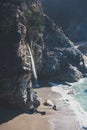 Beautiful aerial view of Mcway Falls with Julia Pfeiffer Beach and Pacific Ocean, Big Sur, Monterey County, California, United
