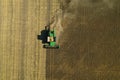 Beautiful aerial view of modern combine harvester working in field. Agriculture industry Royalty Free Stock Photo