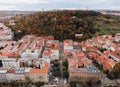 Beautiful aerial view of Prague city in Czech republic - historical part of old town and Petrin Hill in autumn time - taken by Royalty Free Stock Photo