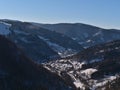 Small village Todtnau, Germany, located in a valley in Black Forest mountain range, in winter season with snow-covered trees. Royalty Free Stock Photo