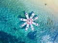 Beautiful aerial view of SUP (stand up paddleboard) yoga in the Mediterranean Sea, Croatia. Royalty Free Stock Photo