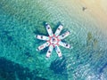 Beautiful aerial view of SUP (stand up paddleboard) yoga in the Mediterranean Sea, Croatia. Royalty Free Stock Photo
