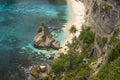 Beautiful aerial view of tropical paradise beach and rock cliff with amazing turquoise sea water and palm trees in Summer holidays Royalty Free Stock Photo