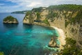 Beautiful aerial view of tropical paradise beach and rock cliff with amazing turquoise sea water and palm trees in Summer holidays Royalty Free Stock Photo