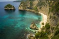 Beautiful aerial view of tropical paradise beach and rock cliff with amazing turquoise sea water and palm trees in Summer holidays Royalty Free Stock Photo