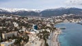 Beautiful aerial view of the Yalta bay in Crimea. Aerial view of Yalta embankment from drone, old Lighthouse on pier, sea coast la Royalty Free Stock Photo