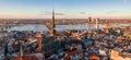 Beautiful aerial winter view over Riga old town with Dome cathedral and river Daugava during sunset.