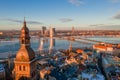 Beautiful aerial winter view over Riga old town with Dome cathedral and river Daugava during sunset.