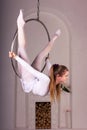 Girl training on aerial ring Royalty Free Stock Photo