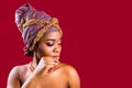 beautiful africa-american woman with turban ower the head in studio